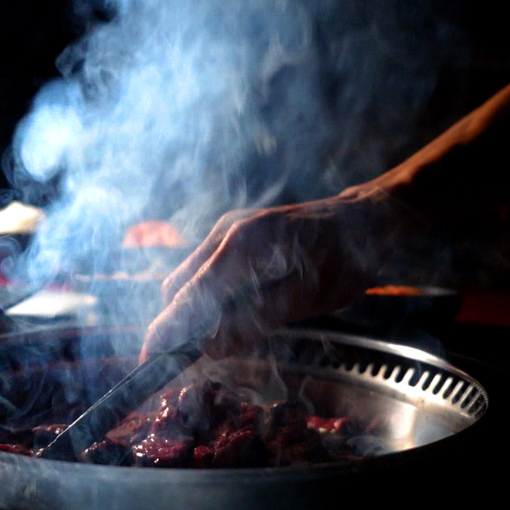 Meat grilling at Gangnam Asian BBQ