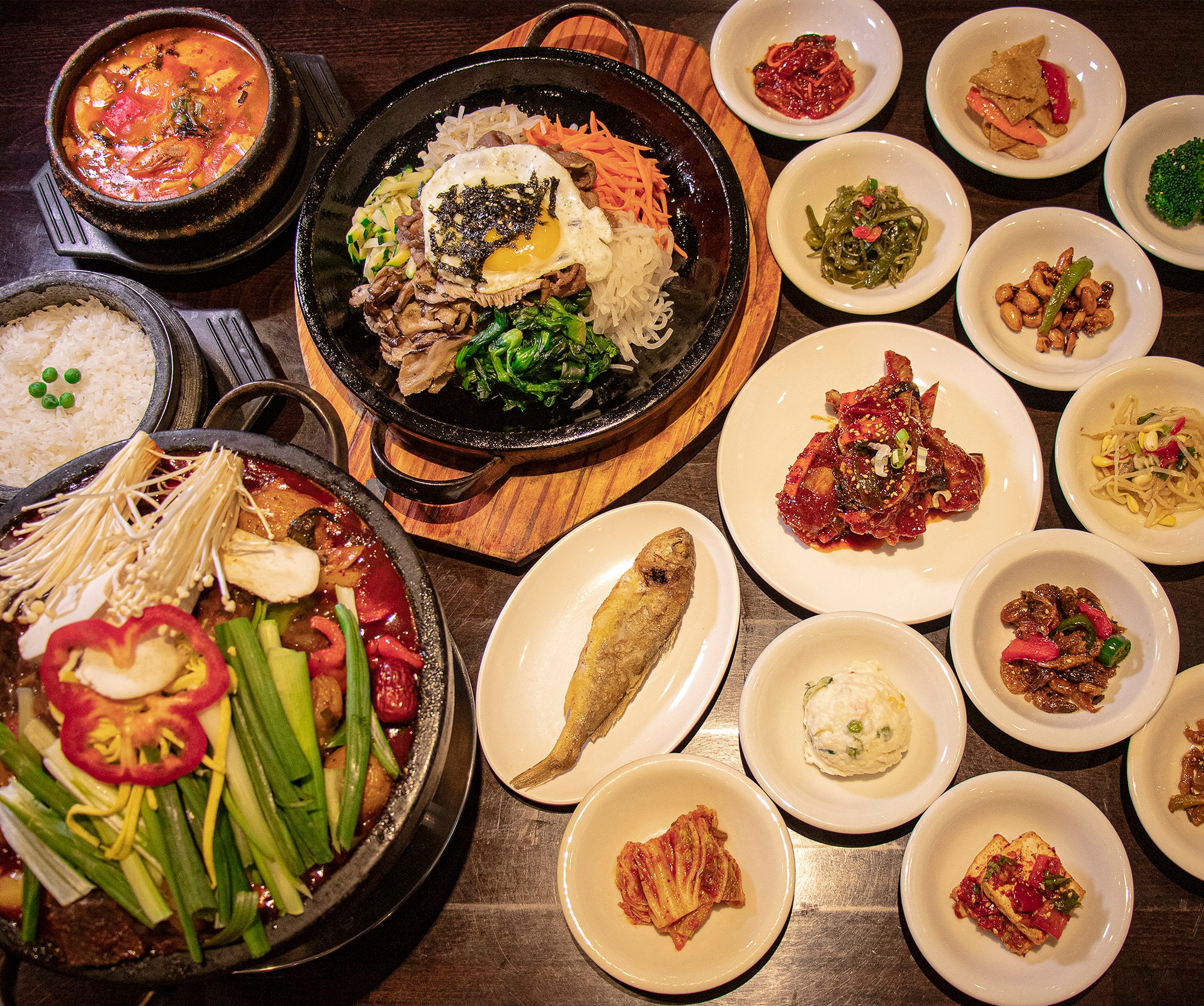 Tofu stew, rice and an assortment of Korean side dishes at Mr. Tofu